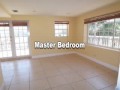 unique, beautiful & generous size house w/enough room for the whole family & large boats. open & spacious 4bd/2ba, plus loft/game room, family room & living room. ocean views from 2nd & 3rd floor. totally fenced & gated with paved entryway & carport. large waterfront terraces to enjoy the ocean breeze. concrete dock w/davits on deep, clean canal w/direct ocean access.