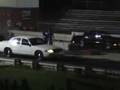 Two fast Crown Vics with nitrous making passes at 