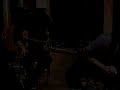 stacy and paul at a house concert in washington.  the tunes are ua like no a like, hue hue and tickling the strings.