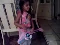 Murreia playing her guitar Murreia playing her guitar