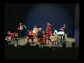 click this link for part 2:
http://www.youtube.com/watch?v=7ojn-guf4ws
-----------------------------
part 1 of trumpeter/composer daniel barry directing his orignal composition 