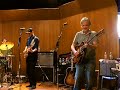 A few tidbits for you all: I don't know what that white box is to Greg's right (our right, his left!) but I definitely remember seeing it with him at all the BR shows. Perhaps someone who is more musically knowledgable than I could clue us in as to what it is called.Also: The white sheet of paper on the amp behind the 