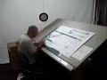 Logan Hicks cutting out stencils
