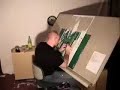 Logan Hicks cutting out stencils