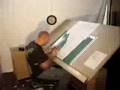 Logan Hicks cutting out stencils