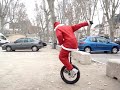 Père Noël en Monocycle Père Noël en Monocycle