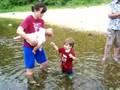 Kids playing at the river