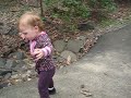 Ian and Chloe walking on a trail