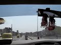 Driving car in New Delhi through Busses, cars, Ricshas