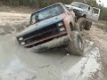 ford bronco and chevy in mud