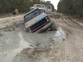 Ford Bronco and Chevy in Mud