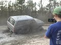 ford bronco and chevy in mud