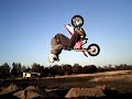 mark houk's backflip attempts on a 50cc.  including jumps by joel litchfield.  taped and produced by michael lutz
