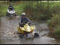 Two Quad Suzuki LTZ 400 in the Mud Two Quad Suzuki LTZ 400 in the Mud