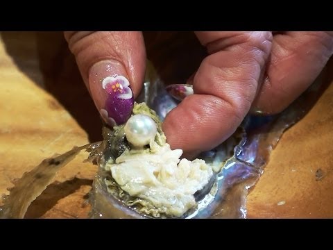 how to know if an oyster has a pearl in it