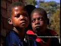 http://karmavision.tv/video/498/children_orphaned_by_aids_in_zimbabwe_struggle_to_survive.html

once things were brighter here; there were job and fathers and mothers. disease and death wrecked all that. now, it is their frail and aging grandmother who is the centre of their lives. some of her seven grandchildren are not well. some are not at school. 13-year old lillian is strong and studious. she's had to grow up fast. lillian zuze -- age 13: 