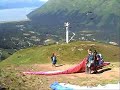 Paragliding at Alyeska Resort in Alaska in 2003.  See a few false starts and a successful takeoff.