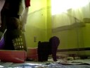 Ace climbing his cage.