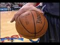 walter hermann of the detroit pistons showing off his ability to palm a basketball with merely his index finger and thumb!