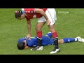 Rio Ferdinand picks up Tim Cahill by the shirt