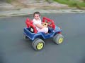 Hannah driving a supercharged power wheels jeep