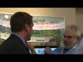 Rob Riggle of the Daily Show hassles Wolf Blitzer
