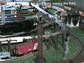 When I built my layout, I incorporated two reverse loops so that I could turn the long trains that I run no matter which direction they were running. Here's a video showing both of the reverse loops in operation. It stars an MTH Premier PRR K4s hauling the longest possible train.  Please visit my web site - http://www.toytrains1.com - to see lots more videos of model (and real) trains in action!  The videos on my web site are available in Real Media, Windows Media, and MPEG-4 formats in much higher resolution and much higher quality than you get to see here on YouTube.