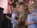 Tyler and Jonah sing songs with their preschool class