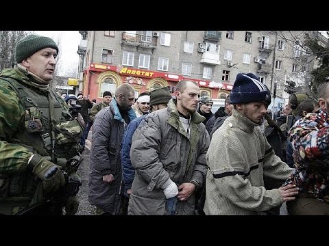 crowd - Captured Ukrainian servicemen have been taken to the scene of Thursday's deadly bus stop attack in Donetsk and paraded before an angry crowd, firmly convinced that Kyiv was behind the bloodshed.