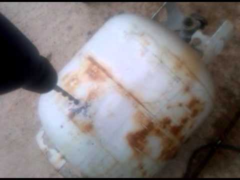 how to remove lpg cylinder cap