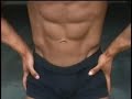 Ripped bodybuilder Mike Patino posing outdoors