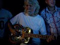 this is taken from when me, my cousin lars morten and his wife elisabeth got to meet john mceuen from nitty gritty dirt band at country festival vinstra 7th july 2007, lars morten ran for 15-20 minutes, to get his dobro guitar for john to sign it, and he just had to try it out!

one of the best and most fun moments in my life as of yet!