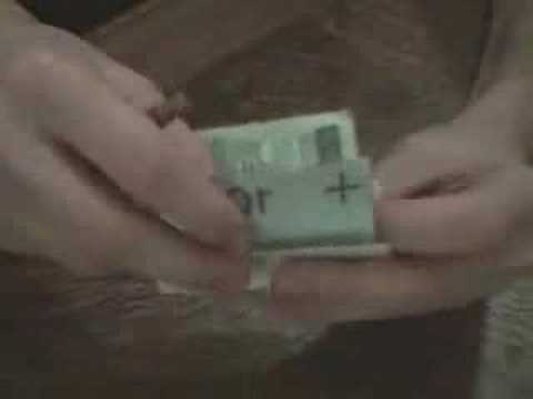 Miniaturka - Ołówek przez banknot