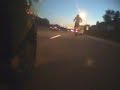 Supermoto wheelie through traffic