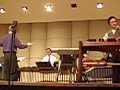 arthur lipner plays with the ecu percussion ensamble. i think the setup of the room paired with the crappiness of th mic in my camera hinders the sound greatly.