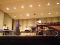arthur lipner plays with the ecu percussion ensamble. i think the setup of the room paired with the crappiness of th mic in my camera hinders the sound greatly.