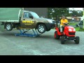 Kubota Tractor tows the Cartar FL Mobile Lift in Body Shop