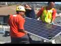 Barack Obama Green Jobs installing Solar Panels