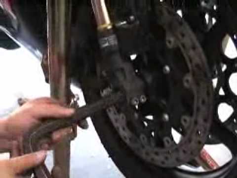 Motorcycle wheel front - removal and installation