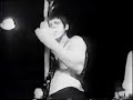 archival footage of james chance and the contortions playing in new york city.