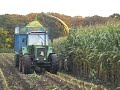 Maishakselen Fendt 311 en John Deere hakselaar