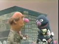 Classic Sesame Street - Grover in line at the supermarket