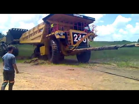 stuck - This CAT777 dumper got stuck in a soft muddy spot and it took a D10 dozer as well as a big loader to get it out. We loaded this dumper with single wheels at ...