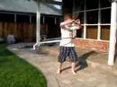 Heny hula hooping outside
