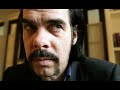 nick cave and the bad seeds - darker with the day album: no more shall we part (2001) lyrics: as so with that, i thought i'd take a final walk the tide of public opinion had started to abate the neighbours, bless them, had turned out to be all talk i could see their frightened faces peering at me through the gate i was looking for an end to this, for some kind of closure time moved so rapidly, i had no hope of keeping track of it i thought of my friends who had died of exposure and i remembered other ones who had died from the lack of it and in my best shoes i started falling forward down the street i stopped at a church and jostled through the crowd and love followed just behind me, panting at my feet as the steeple tore the stomach from a lonely little cloud inside i sat, seeking the presence of a god i searched through the pictures in a leather-bound book i found a woolly lamb dozing in an issue of blood and a gilled jesus shivering on a fisherman's hook babe it seems so long since you've been gone away and i just got to say that it grows darker with the day back on the street i saw a great big smiling sun it was a good day and an evil day and all was bright and new and it seemed to me that most destruction was being done by those who could not choose between the two amateurs, dilettantes, hacks, cowboys, clones the streets groan with little caesars, napoleons and cunts with their building blocks and their tiny plastic phones counting on their fingers, with crumbs down  ... 