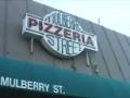 YaYa makes pizza at Mulberry Street Pizza