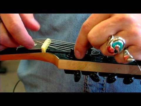 how to change electric guitar strings