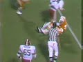 Georgia's Herschel Walker runs over Tennessee's Bill Bates