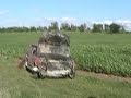 bulldozer crushes running topaz car