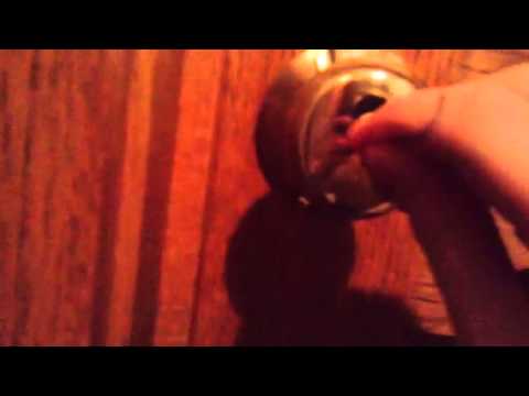 how to unlock a door with a paperclip